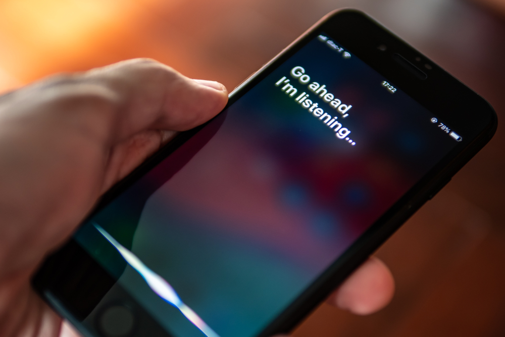 Person using Apple Siri